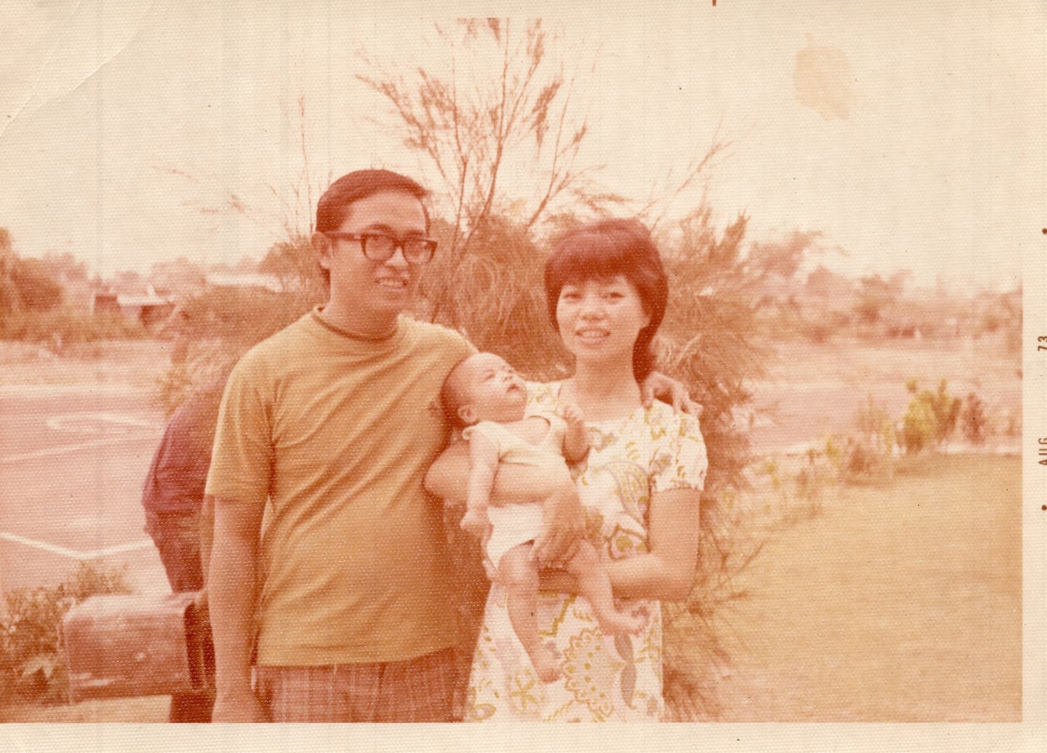 Family photo before and after AI restoration — original