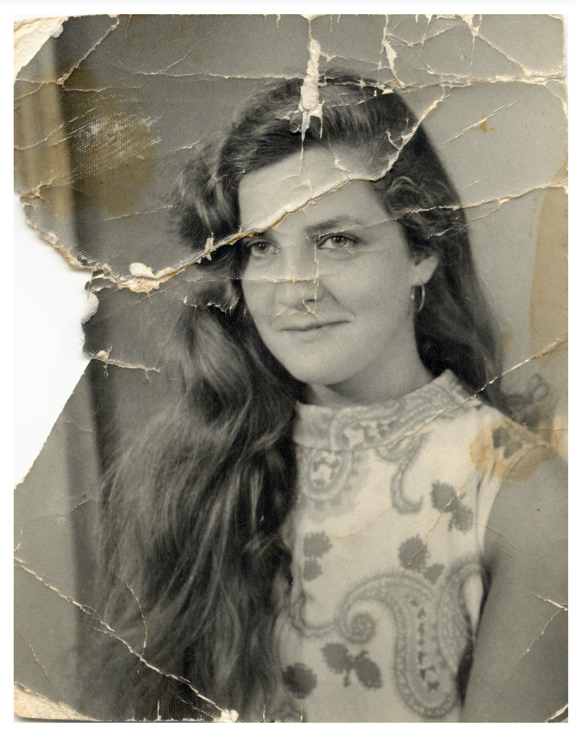 Torn black and white portrait before and after restoration — original